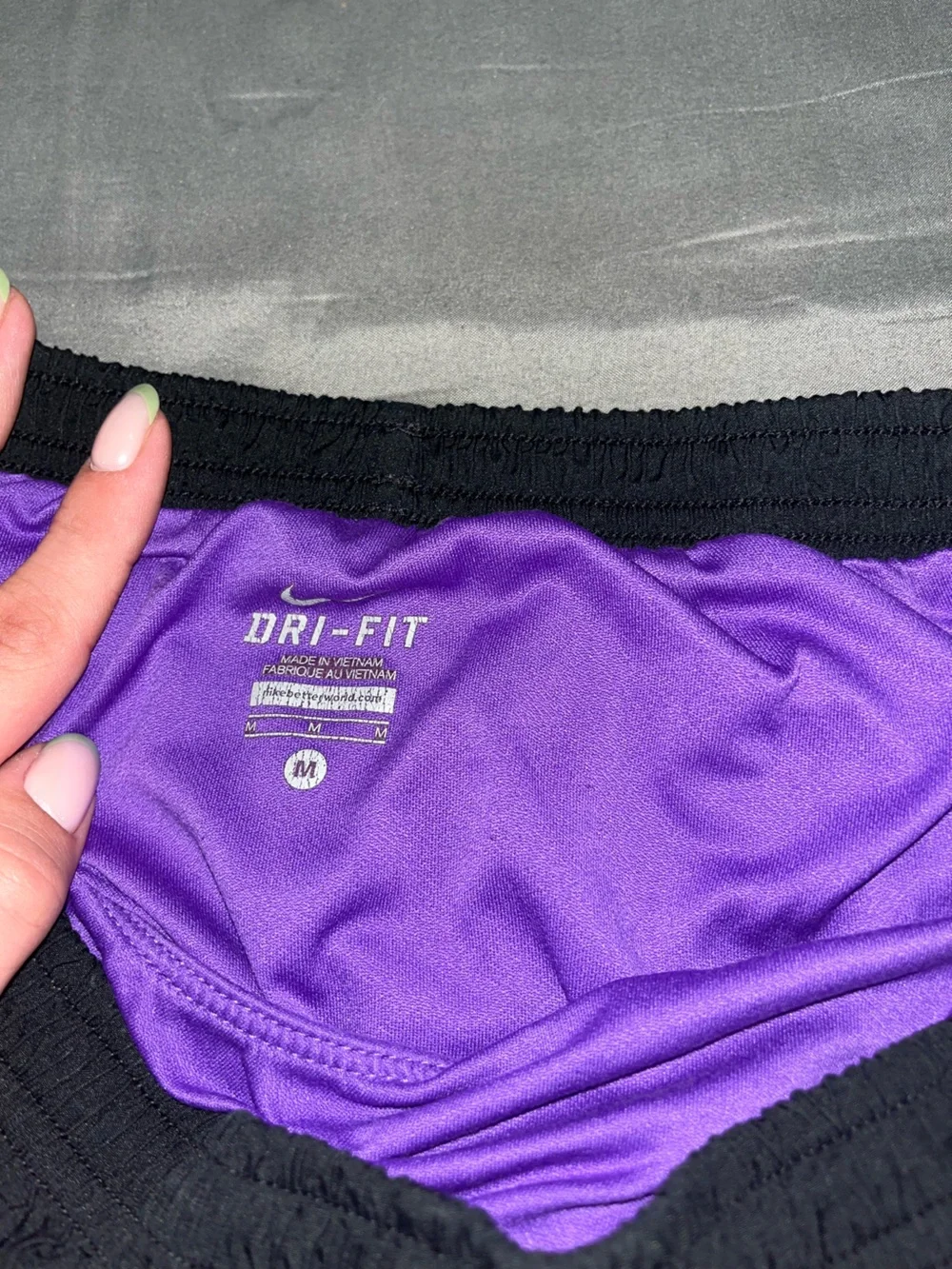 Nike Black Athletic Shorts with Purple Piping